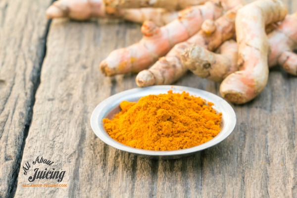 fresh turmeric root and powder